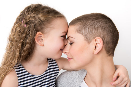 Cute Preschool Age Girl With Her Mother, Young Cancer Patient In Remission. Cancer Patient And Family Support Concept.