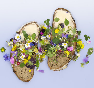 bread slices with butter and edible flowers