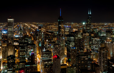 Chicago Skyline top view with illuminated skyscrapers by night, Illinois, USA