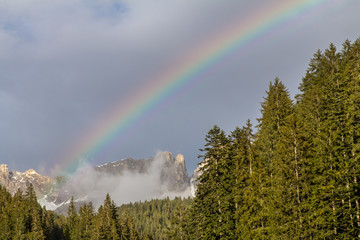 Colorful rainbow over the mountains