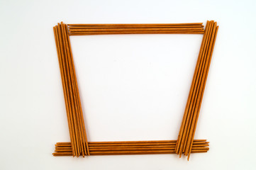 The frame is irregular in paper tubes of beige color.