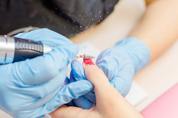 Manicure process, cleaning of nails by a milling cutter