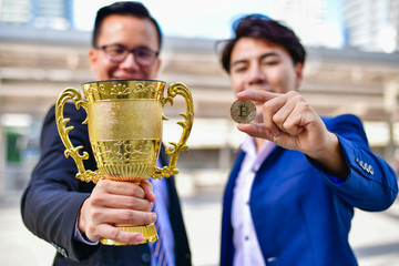Concept business people, Business man succeed in and earn from bitcoin.