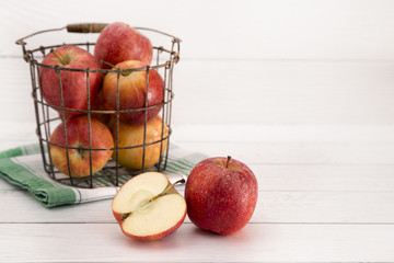 Beautiful Fresh Apples on a White Wooden Table