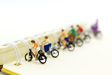 Miniature figure: Parking for motorcycles and bicycles. Image use for parking business concept.