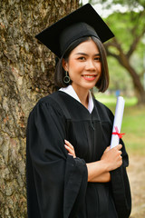Graduation Concept. Graduated students on graduation day. Asian students are smiling happily on the...