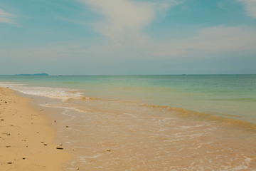Fototapeta na wymiar Beautiful beach with blue sky on sunny day