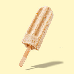 Fruit ice cream on a stick. Bright color, summer mood.