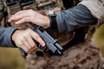 Ranger wearing uniform with gun in hand,keep gun in the holster. military concept