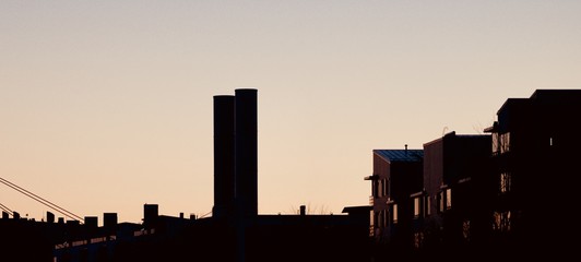 Buildings over the sunset