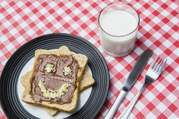 Tasty chocolate bread with funny face