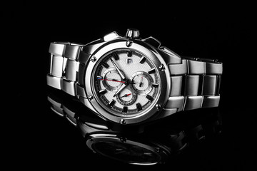 Luxury watch isolated on a black background with reflection. High quality. Highclass.