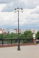 Fototapeta na wymiar Pavement with beautiful lanterns in a big city.