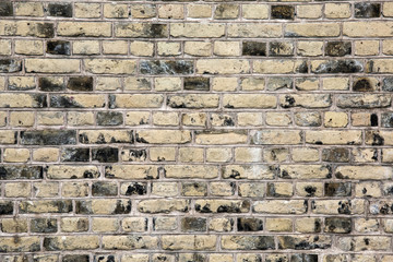 Cracked black brick wall, blocks in a line background