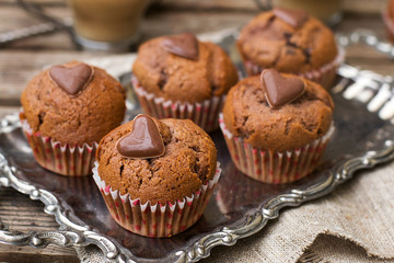 Chocolate muffins with chocolate chips and chocolate heart