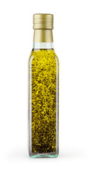 Olive oil with basil in glass bottle isolated on white backgound with clipping path