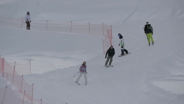 People skiing on a slope 