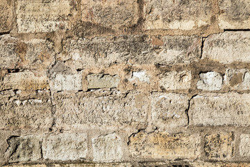 Cracked gray brick wall background