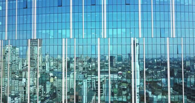 cityscape reflection on a glass facade modern office Building in Kiev