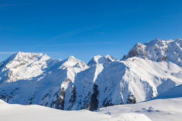 Winter panorama of snowy mountain range in 3 Valleys skiing, snowboard resort, Alps, France