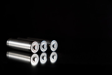 Batteries background energy supply and recycling concept with a copy of space