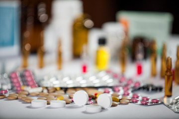 Heap of colorful pills medical background. Pharmaceutical medication and medicine pills in packs. Selected focus with copy space for your text.