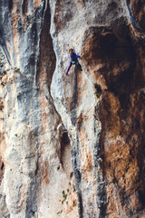 A rock climber on a rock.