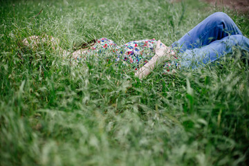 Pregnant girl in the grass
