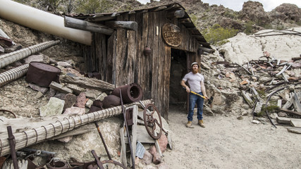 miner at mine entrance