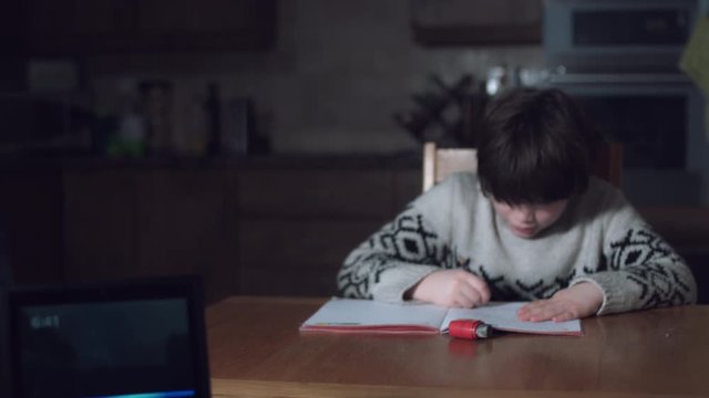 4K Boy Doing Homework with Smart Home Device