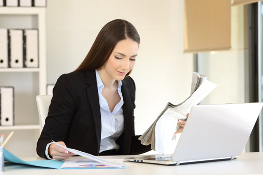 Office worker checking news and documents online