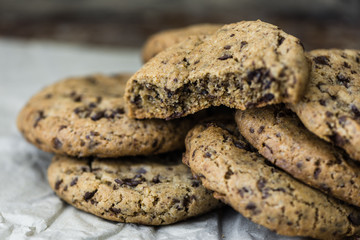 Freshly Baked Chocolate Cookies on Baking Paper. Sweet Biscuits. Homemade pastry.