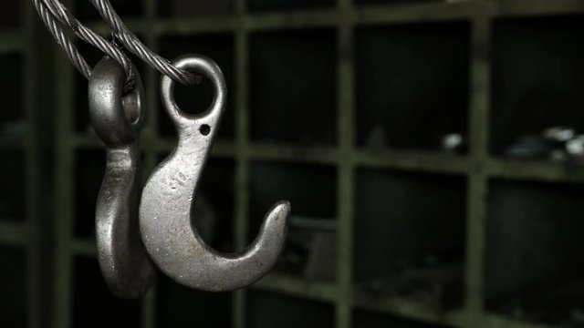 hook of the crane in the workshop for car repair
