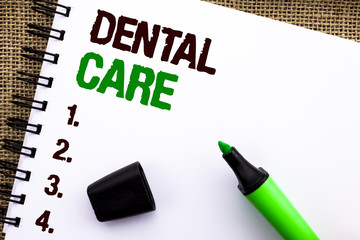Text sign showing Dental Care. Conceptual photo Oral Tooth Mouth Caring Safety Hygiene Protection Regulations written on Notebook Book on the jute background Marker next to it.