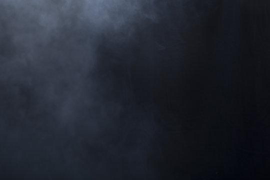 Fog/haze covers left side of screen over a black background © Cinestock