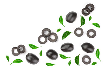 whole and sliced black olives decorated with leaves isolated on white background. Top view. Flat lay pattern