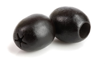 whole black olives isolated on white background macro
