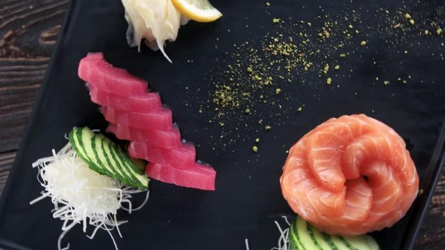 Salmon and tuna sashimi. Fish, ginger and wasabi.