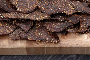 dried beef slices in spices with sesame seeds