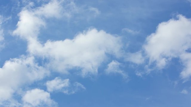 Beautiful cirrus clouds moving across a summer blue sky. It can also be used as a transitional video, a meditative video, or for nature-related projects.