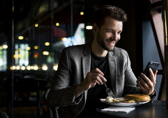 Man reading messages on his phone