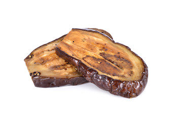 grilled purple eggplant with black pepper on white background