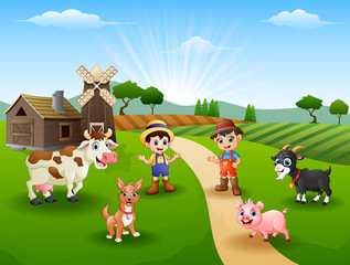 Obraz na płótnie Canvas Young farmers activities with animals on farm