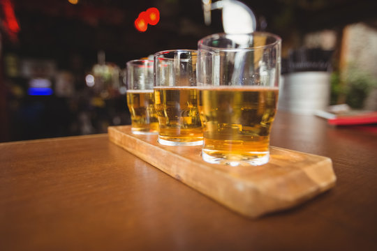 Close-up Of Beer Glasses On The Counter