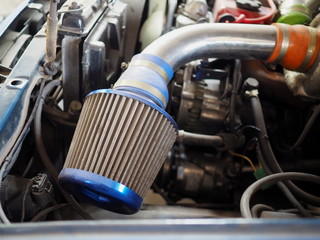 Fototapeta na wymiar Detail of air filter under the car hood.