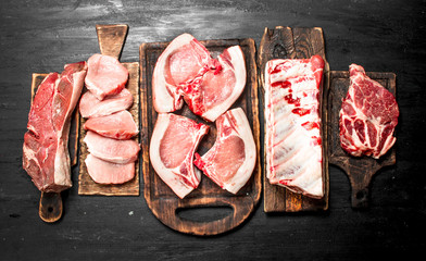 Different types of raw pork meat and beef. - 200031566