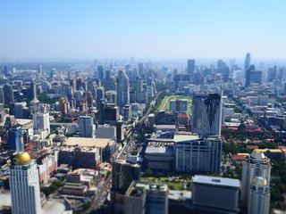 Fototapeta na wymiar Miniature Tilt shift lens effect of modern urban architectural lanscape in Bangkok.