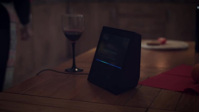 4k Woman Controlling Lights with Smart Home Device