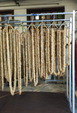 Churchkhela. Preparation of churchkhela. Oriental sweets.