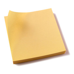 Yellow sticky post it note pad isolated on white background photo